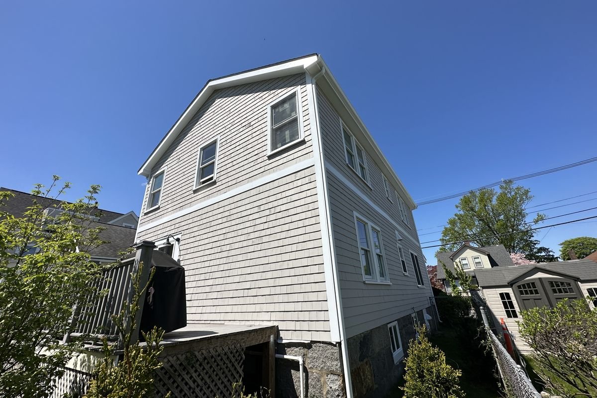 Home exterior after a professional repaint by Painting Now