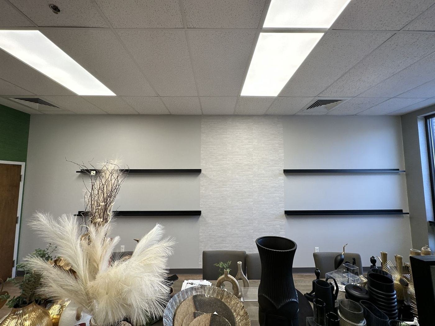 Finished commercial interior with feature wall by WJ Services