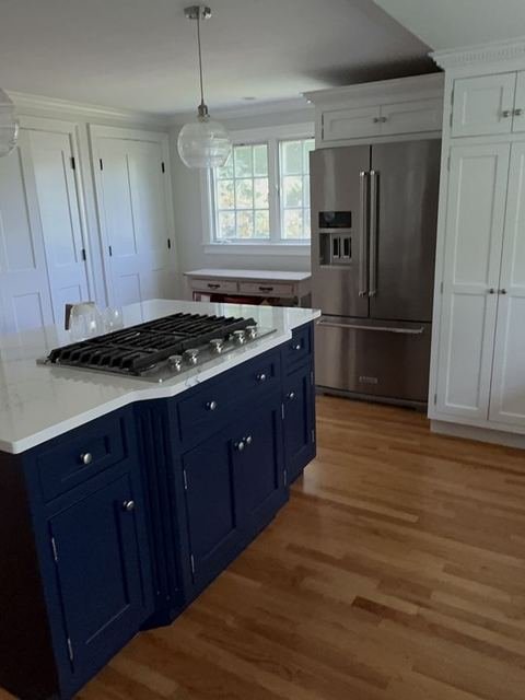 Kitchen island and range front view with custom finish